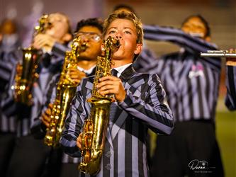 BOY PLAYING SAXOPHONE