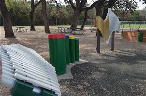 Over-sized musical playground instruments. 