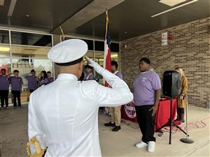 Bobby saluting the flag