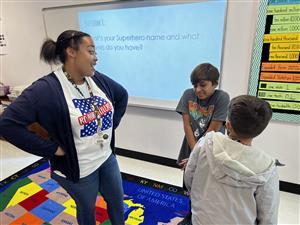 Teacher talking to students