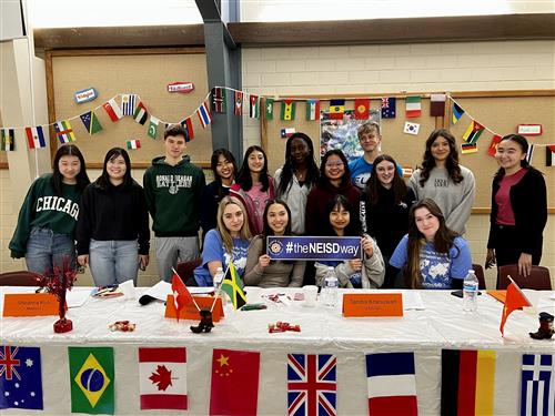 students with NEISDway sign