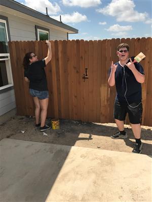 staining the fence 